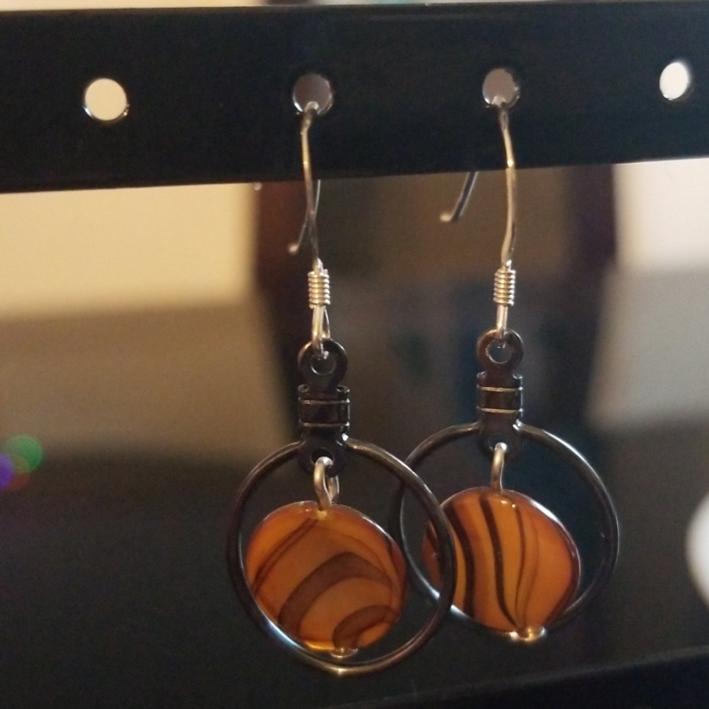 Lightweight amber colored glass earrings
